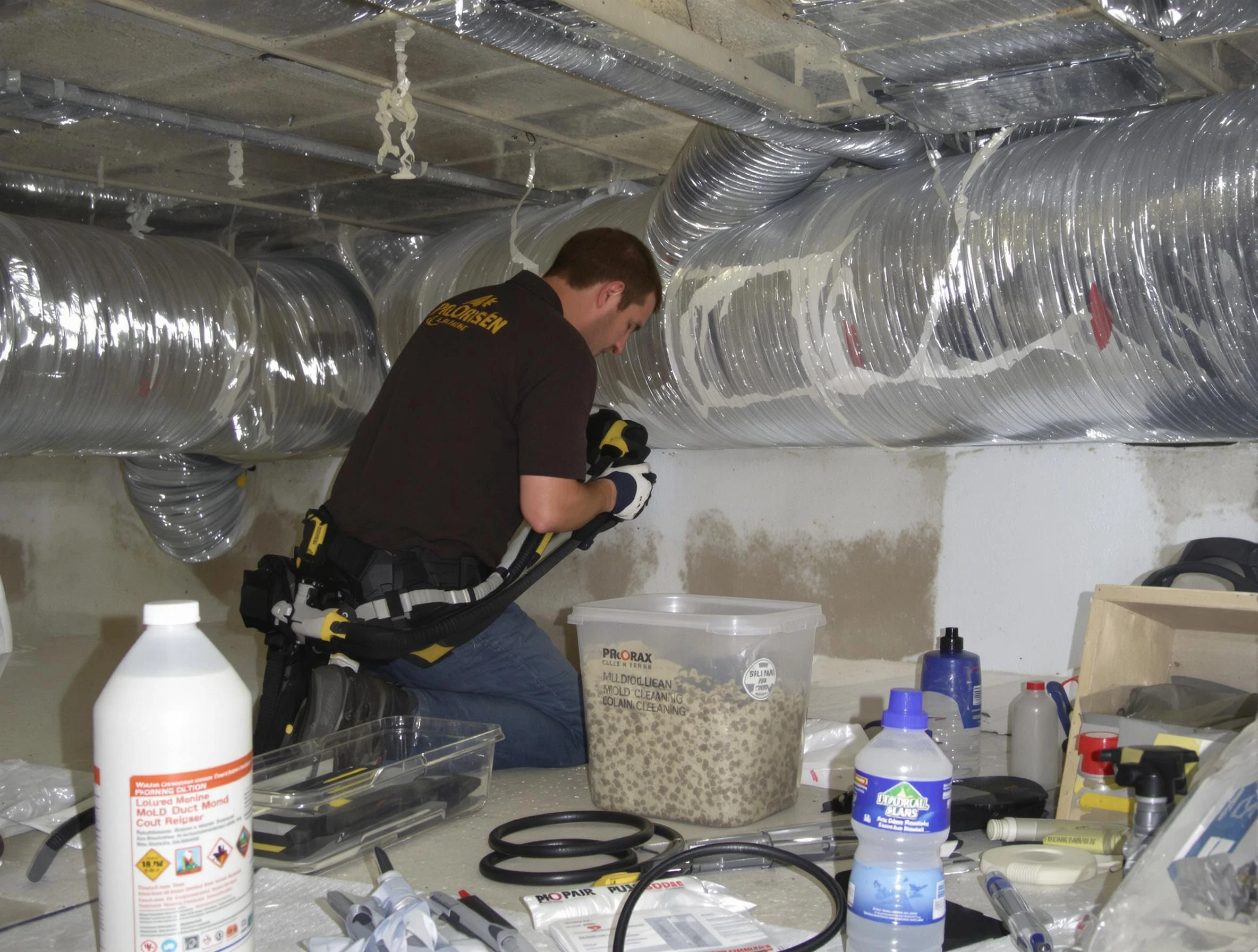 Saugus Air Duct Cleaning specialist performing professional mold removal from air ducts in Saugus